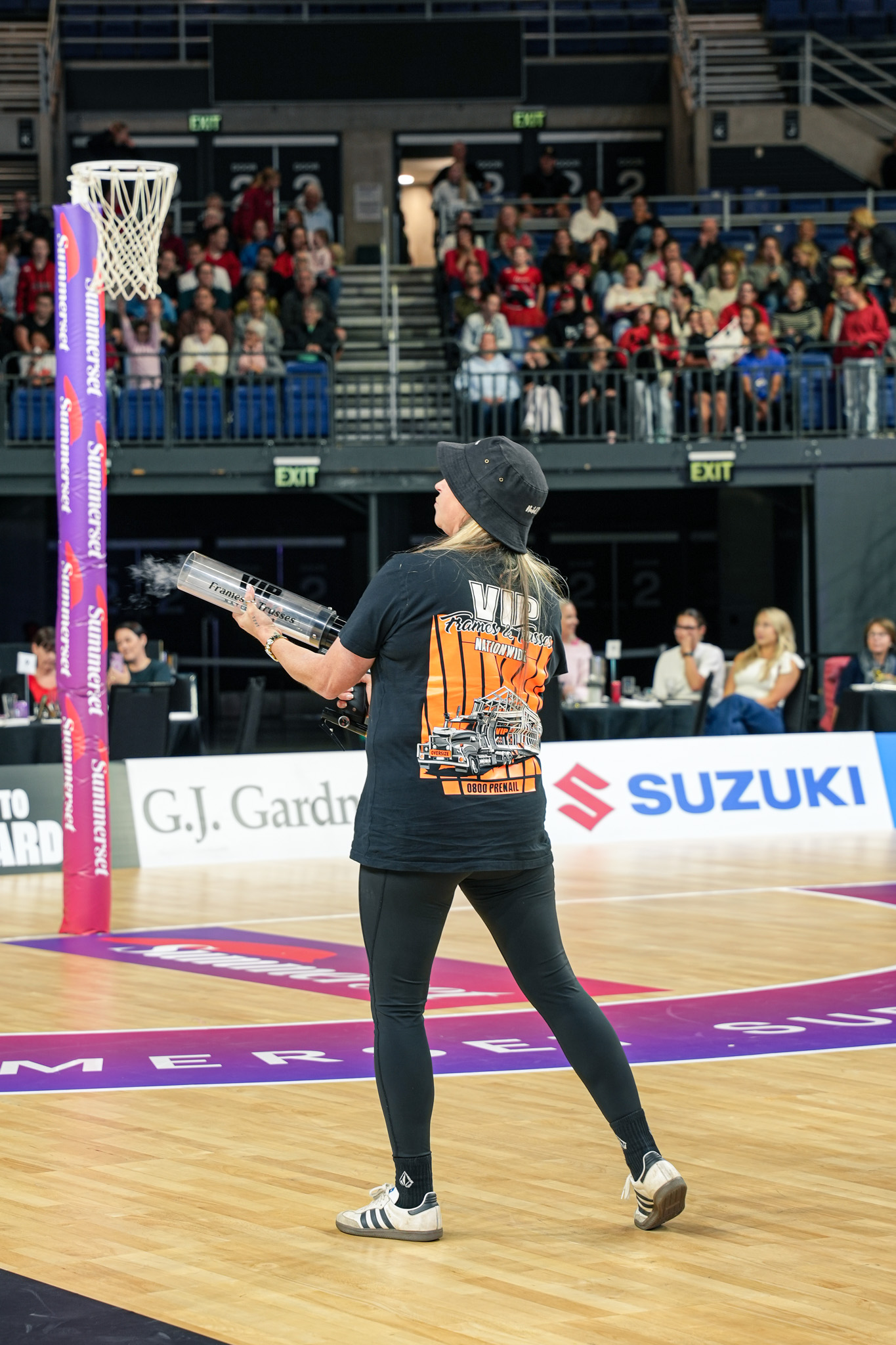 T-Shirt Cannon woman shooting tshirt from cannon gun active marketing at netball game nz