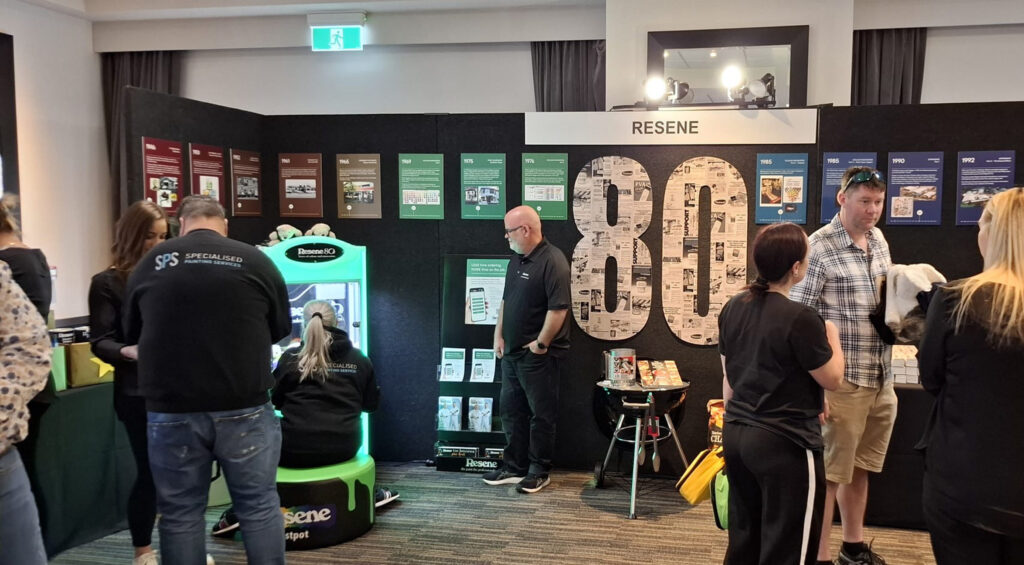 people playing claw machine game at event nz